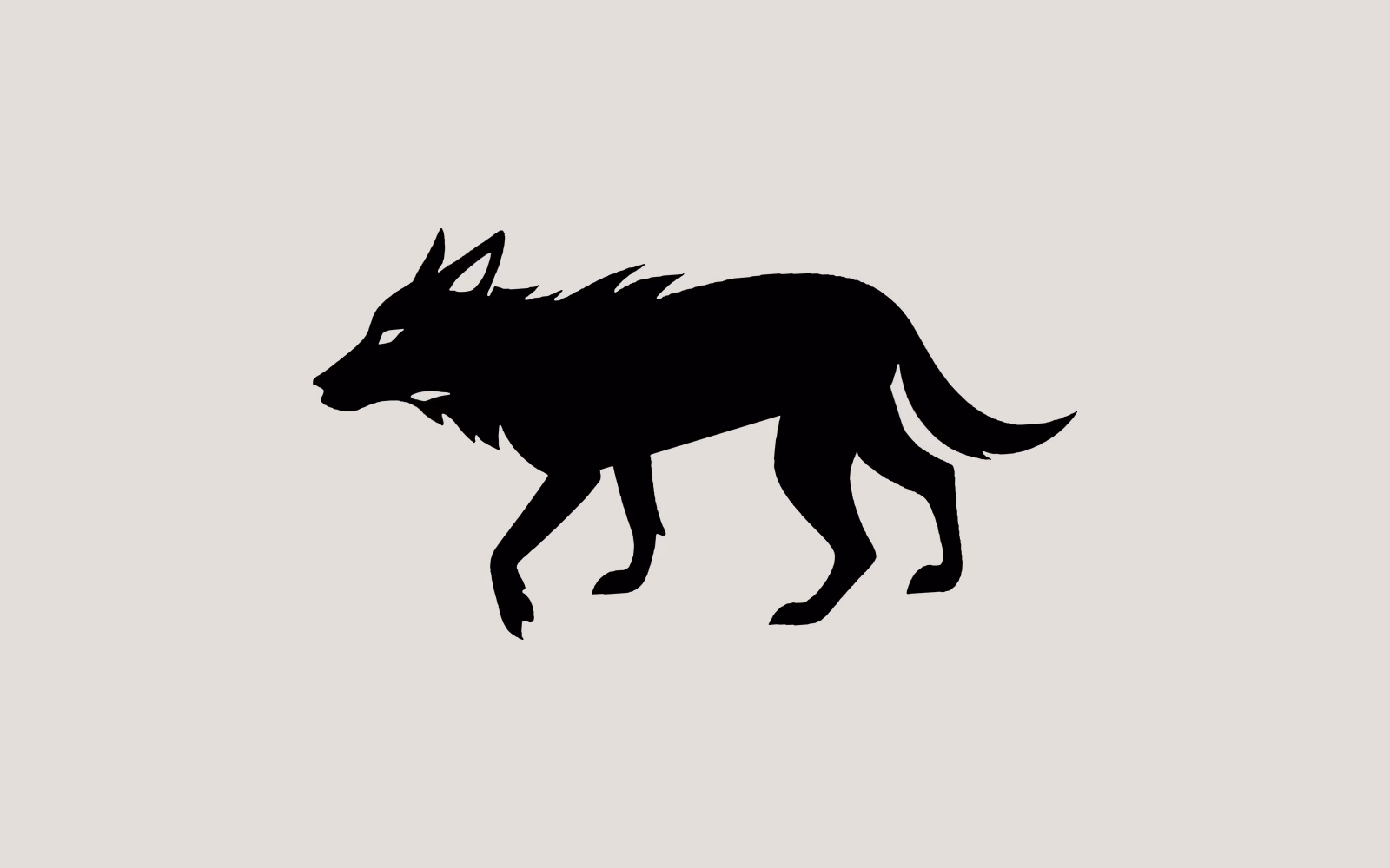 The dingo symbol alone: a lean dog in profile mid-stride, ears up, hackles drawn as cut spikes along the neck and back.