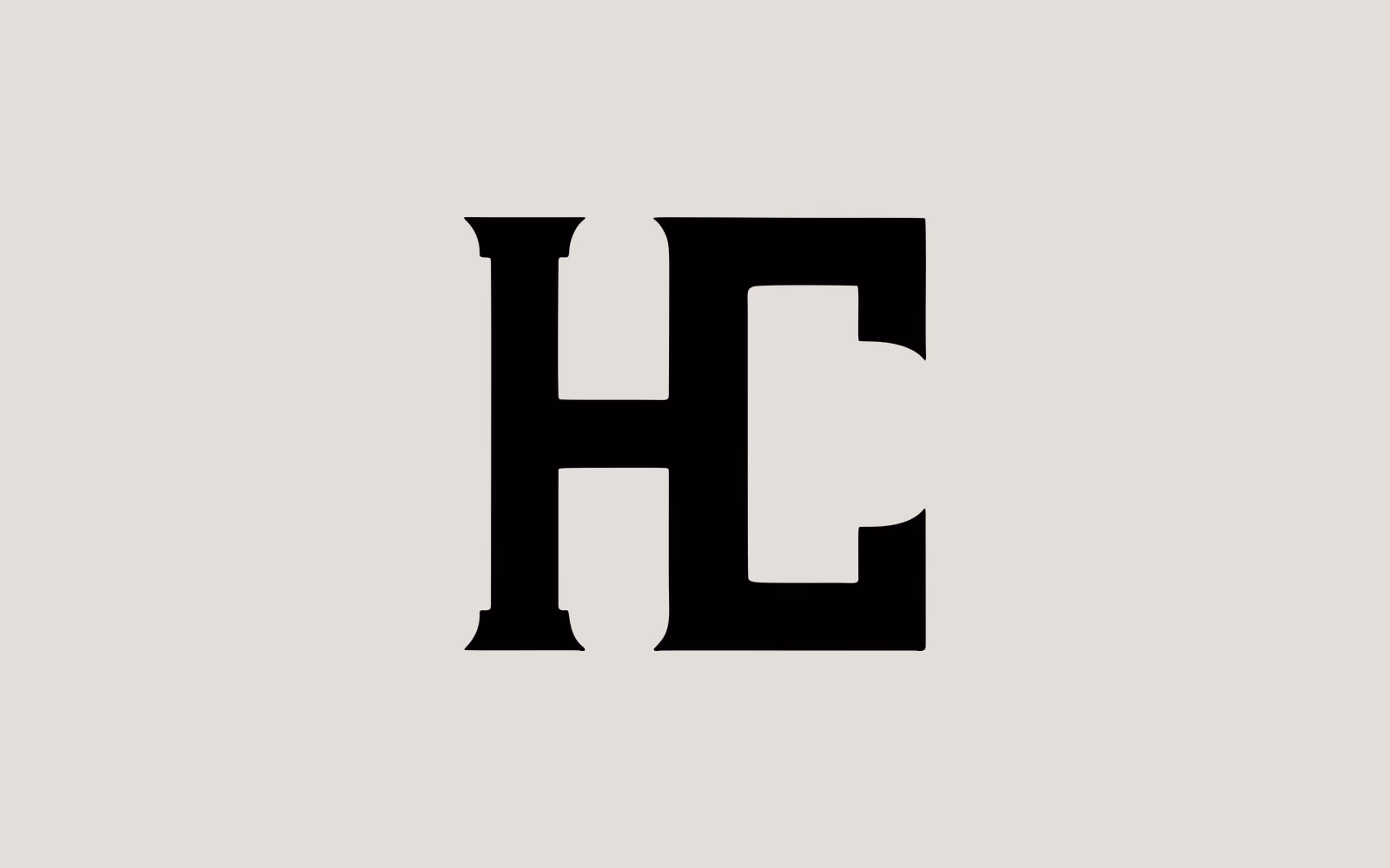 The High Country monogram: a heavy slab H and C joined into one block letterform.