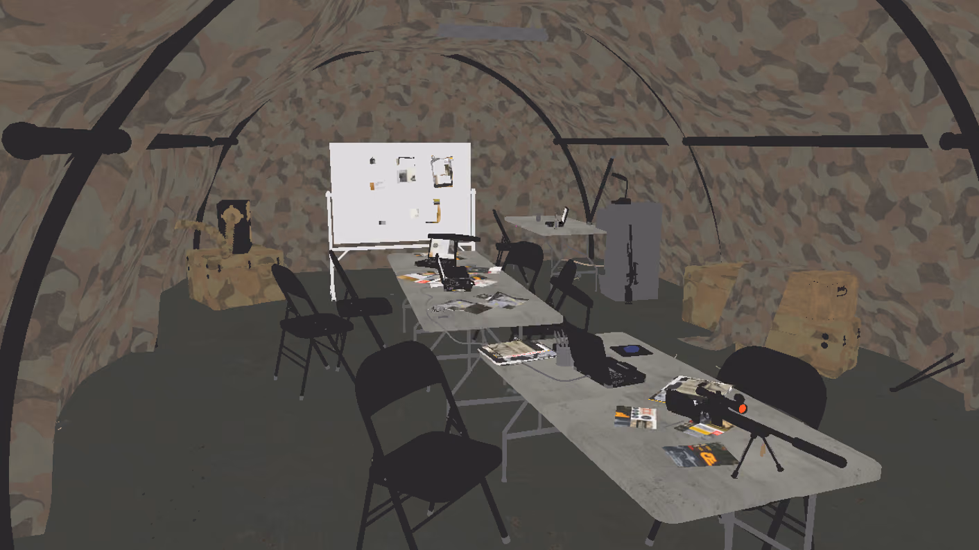 The briefing tent with no lighting applied, flat grey geometry showing the blockout and the placement of every table, chair and crate.